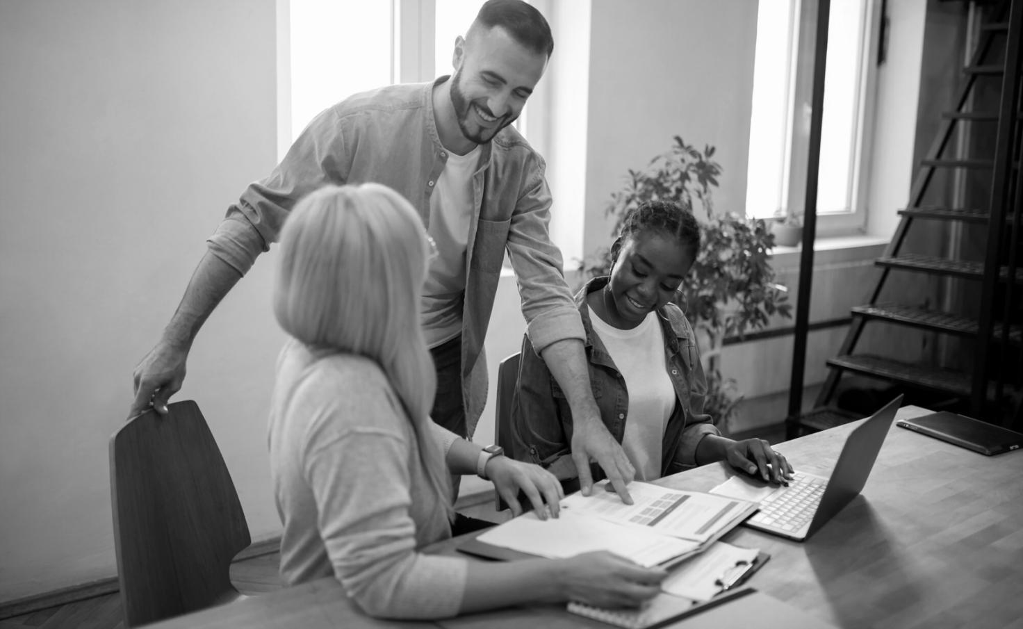 Students collaborating during business communication workshop session